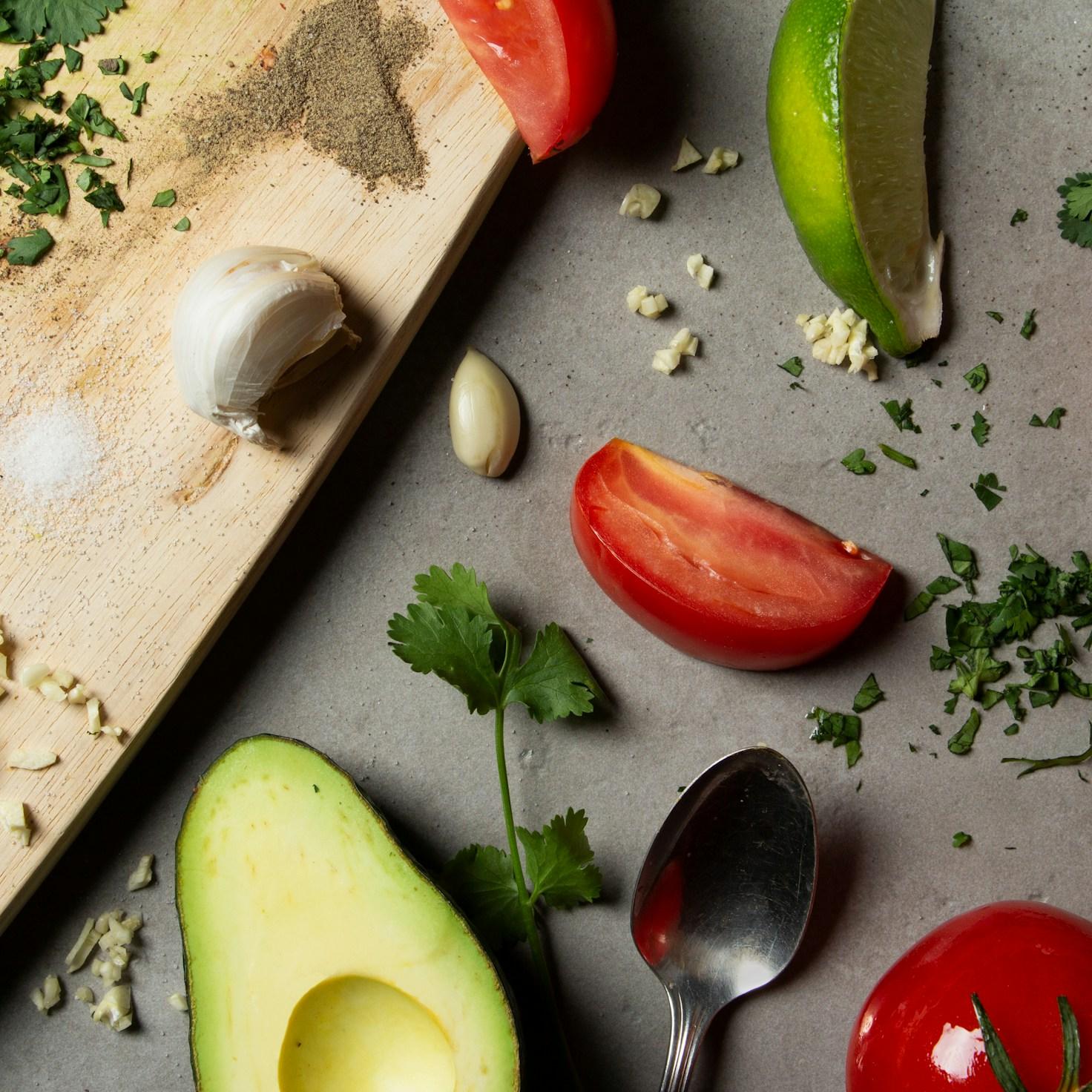 Community members collaborating in a modern kitchen space, sharing recipes and cooking techniques